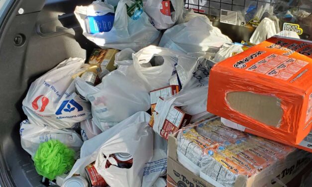 SeaTac Police, Explorers hold ‘Fill the Patrol Car’ food drive
