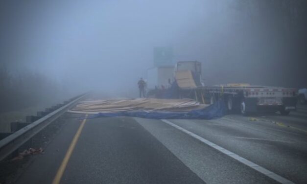 Northbound I-5 lanes blocked at 272nd Street in Kent after semi-truck loses load of plywood Friday morning